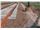 Road and railway base reinforcement using Geogrids and Geotextiles