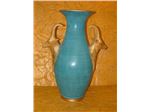 Earthen pot with a deer